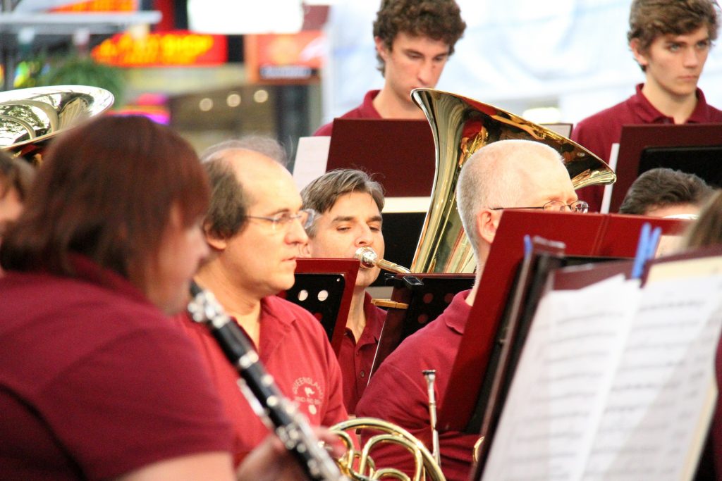 Queensland Wind and Brass plaing different brass instruments